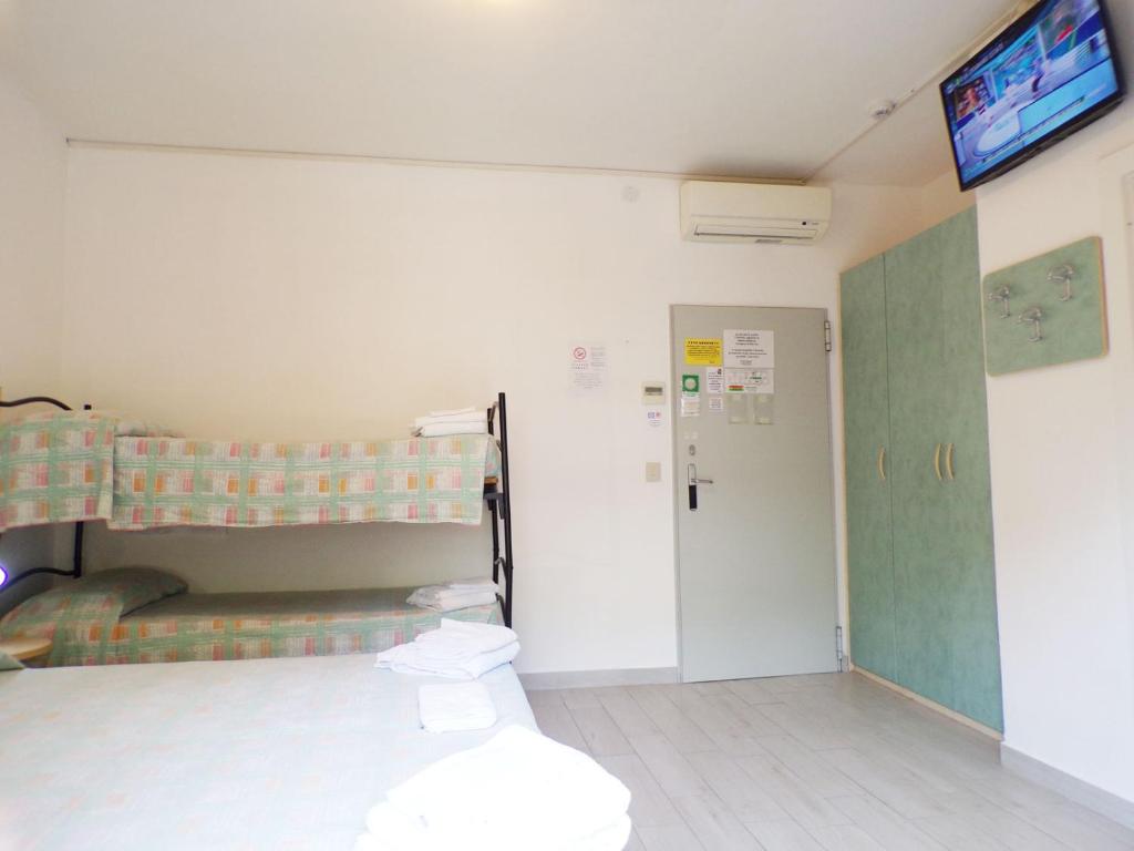 Postel nebo postele na pokoji v ubytování Hotel Esedra
