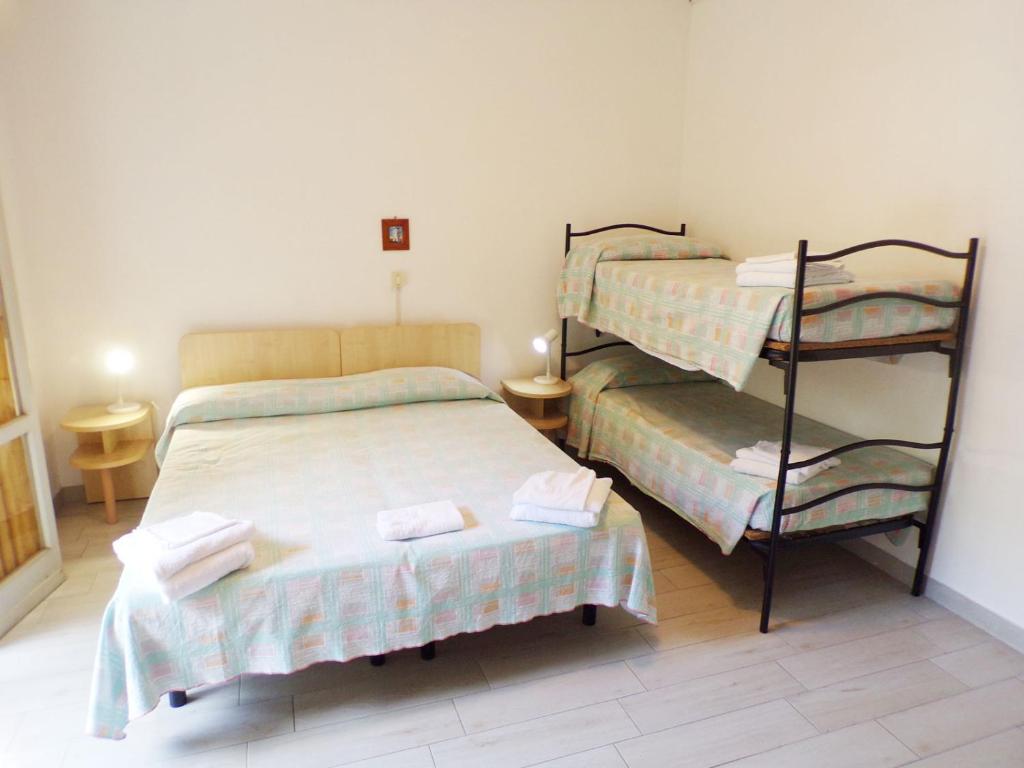Postel nebo postele na pokoji v ubytování Hotel Esedra