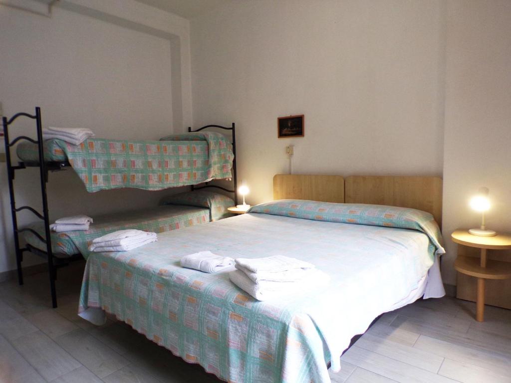 Postel nebo postele na pokoji v ubytování Hotel Esedra