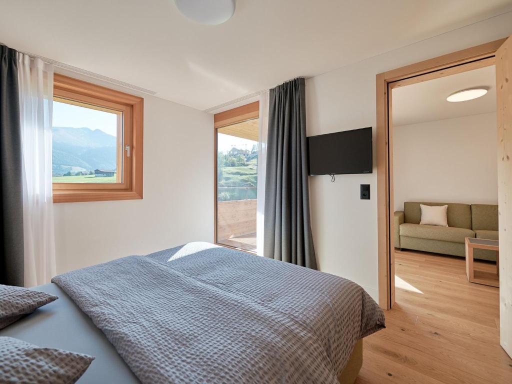 Postel nebo postele na pokoji v ubytování Apartment Catrina 2-Zimmer Standard Apartment by Interhome
