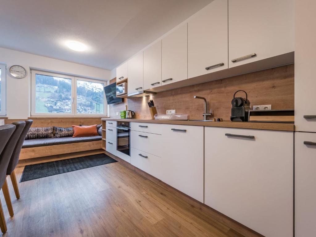 Kuchyň nebo kuchyňský kout v ubytování Apartment Montec Apart 2 by Interhome
