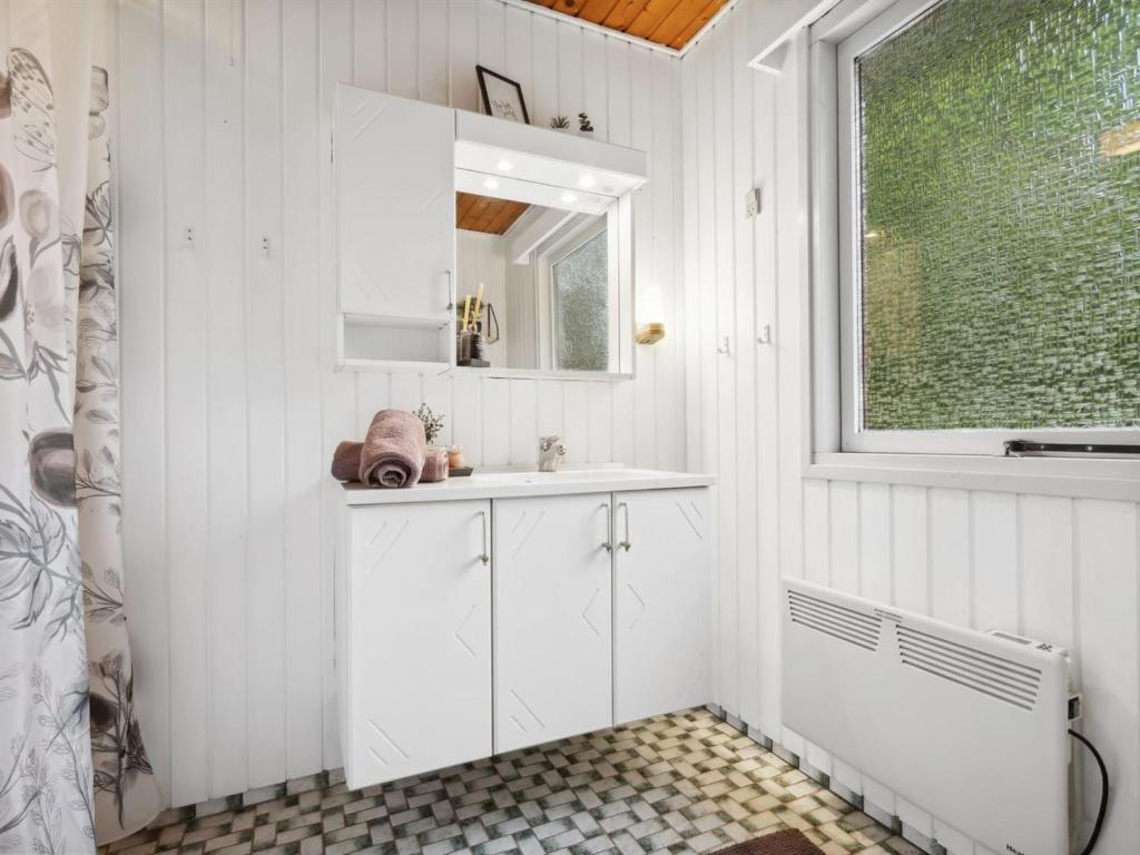 Koupelna v ubytování Holiday Home Nyalle - 30km from the sea by Interhome