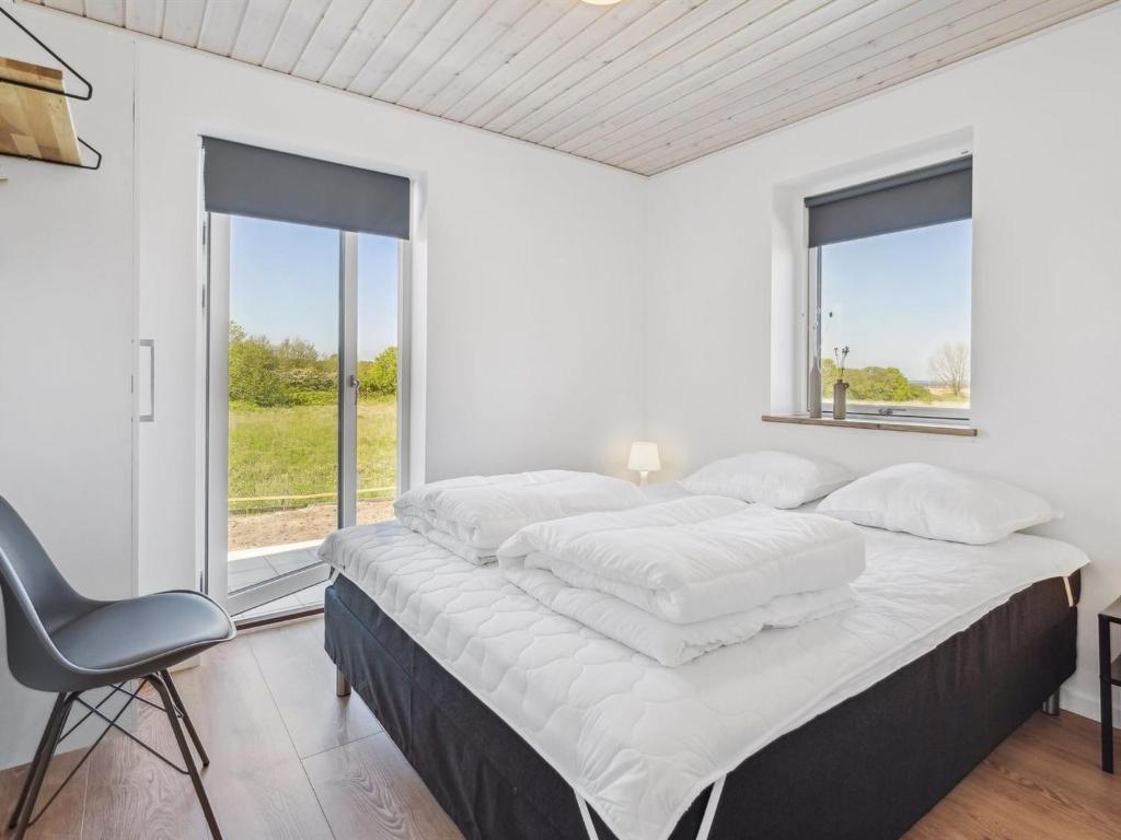 Postel nebo postele na pokoji v ubytování Holiday Home Ika - 450m from the sea by Interhome