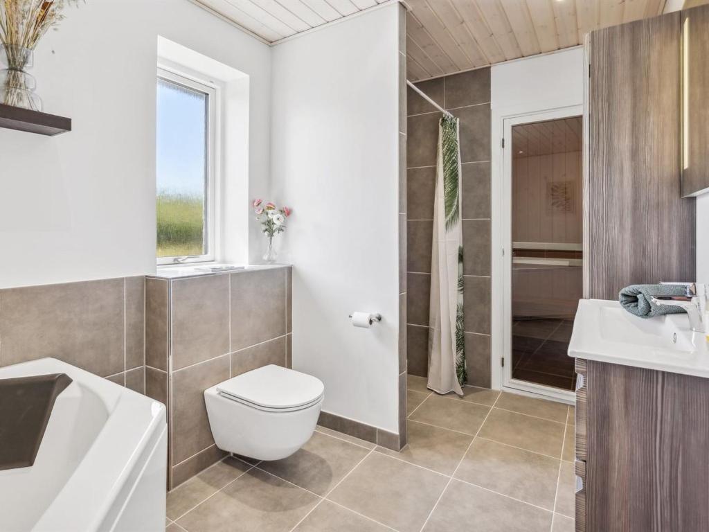 Koupelna v ubytování Holiday Home Ika - 450m from the sea by Interhome