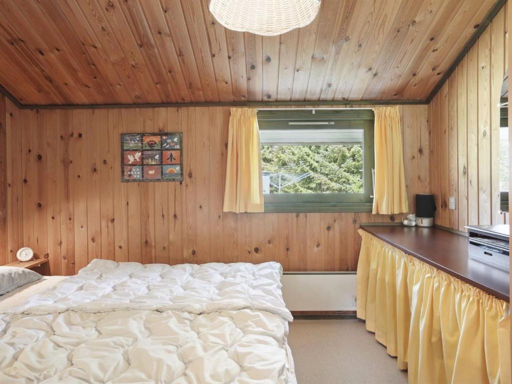 Postel nebo postele na pokoji v ubytování Holiday Home Winter - 500m from the sea by Interhome