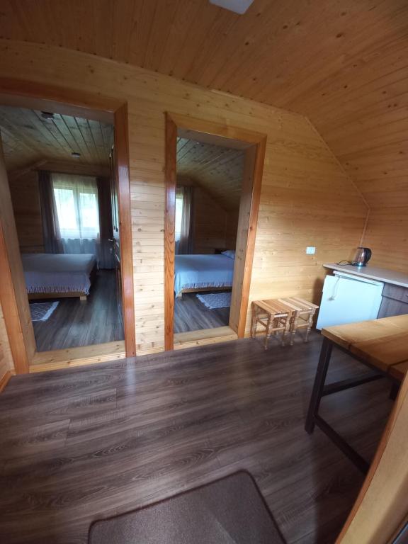 Postel nebo postele na pokoji v ubytování На горі