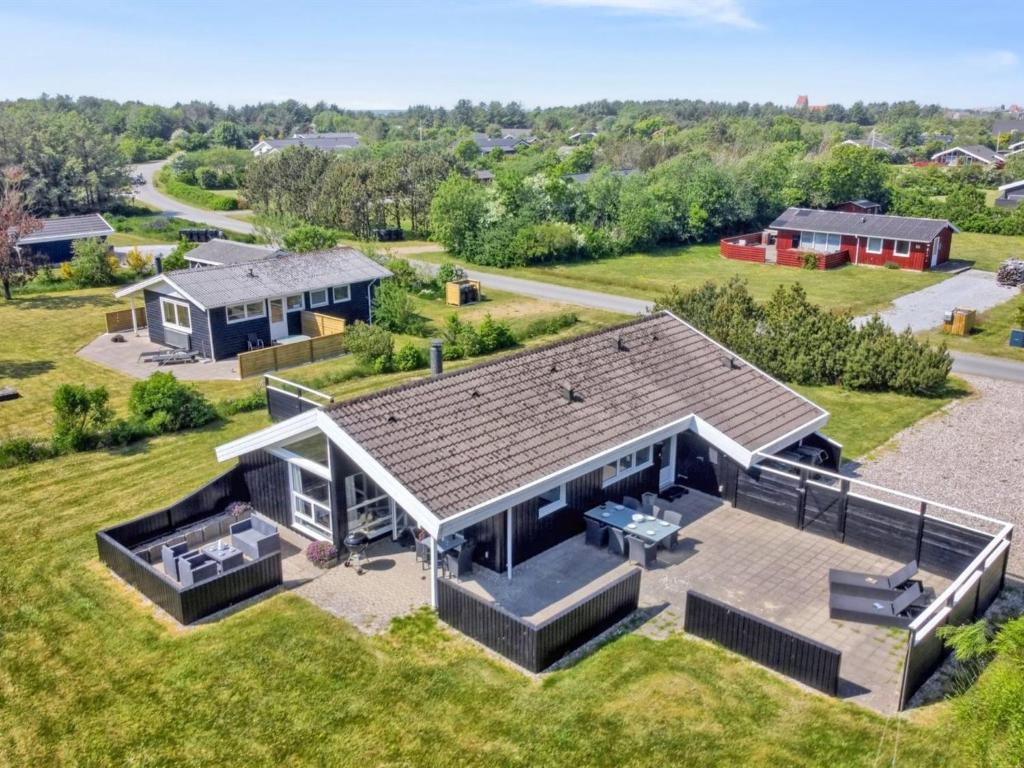 an overhead view of a house with a roof at Holiday Home Apelone - 800m from the sea in NW Jutland by Interhome in Hjørring