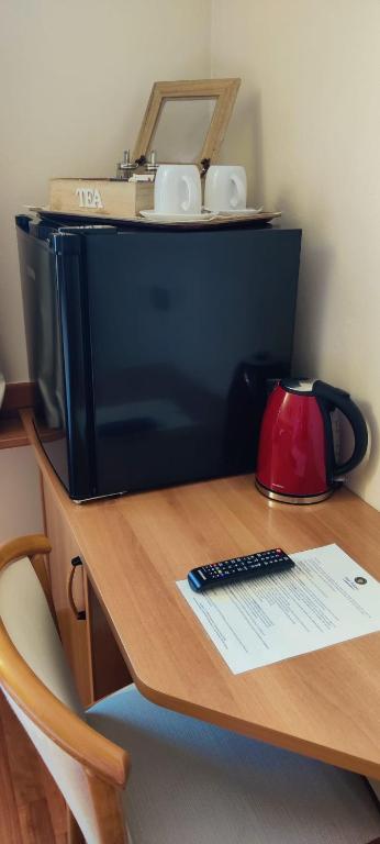 Příslušenství pro přípravu čaje a kávy v ubytování Hotel Postumia