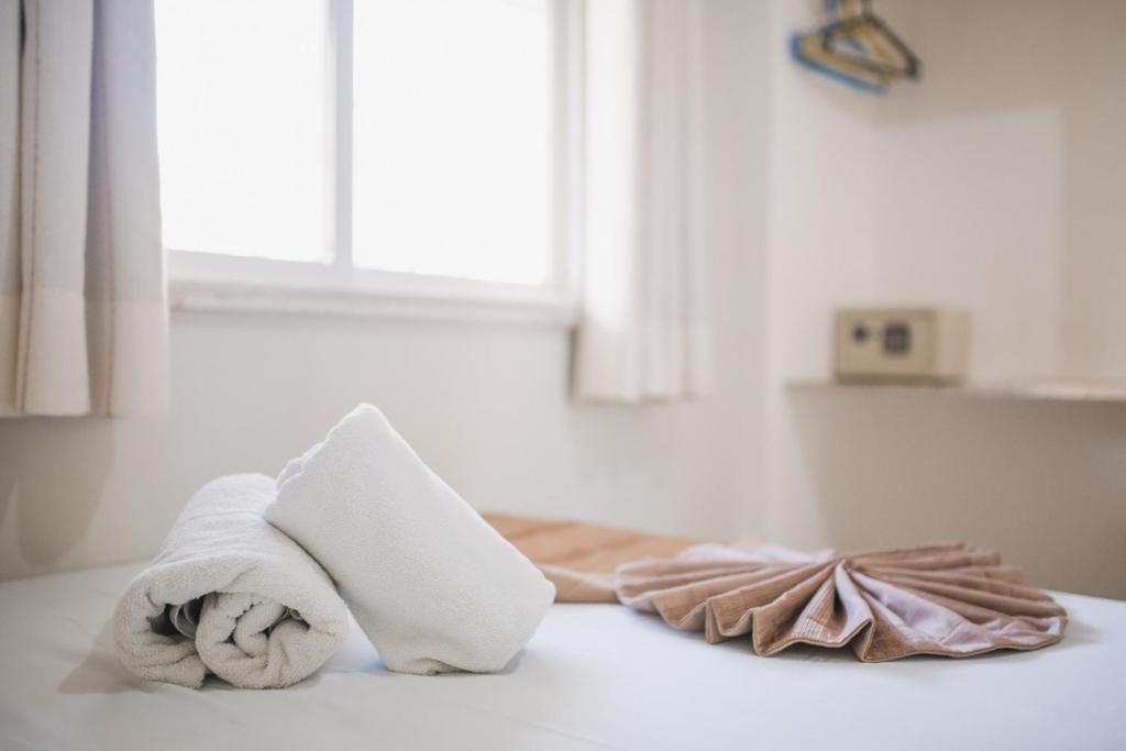 Cama ou camas em um quarto em Hotel Mares de Iracema