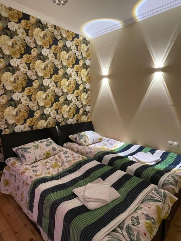Postel nebo postele na pokoji v ubytování Sunny guesthouse