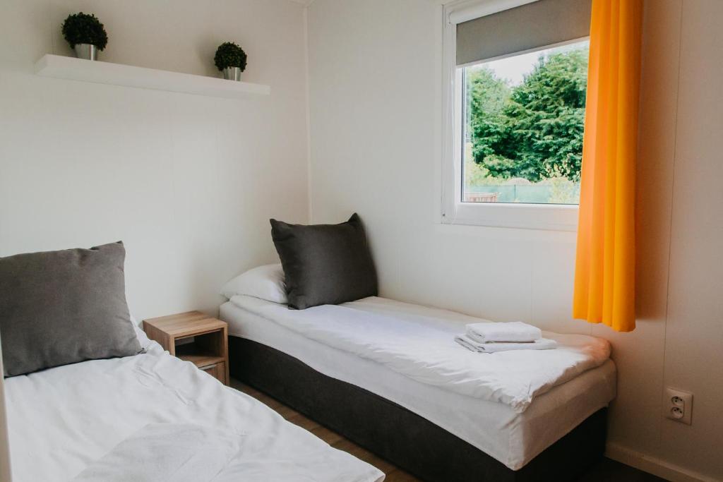 Posteľ alebo postele v izbe v ubytovaní LUXURY CAMP - 150 m od Suntago Park