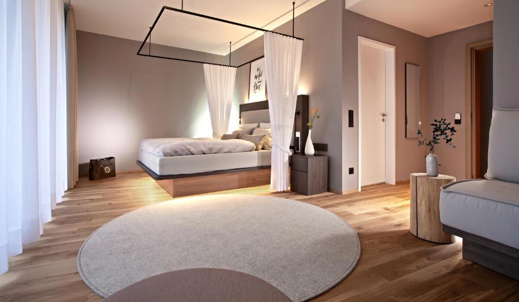 Ein Bett oder Betten in einem Zimmer der Unterkunft Schwarzwald Panorama