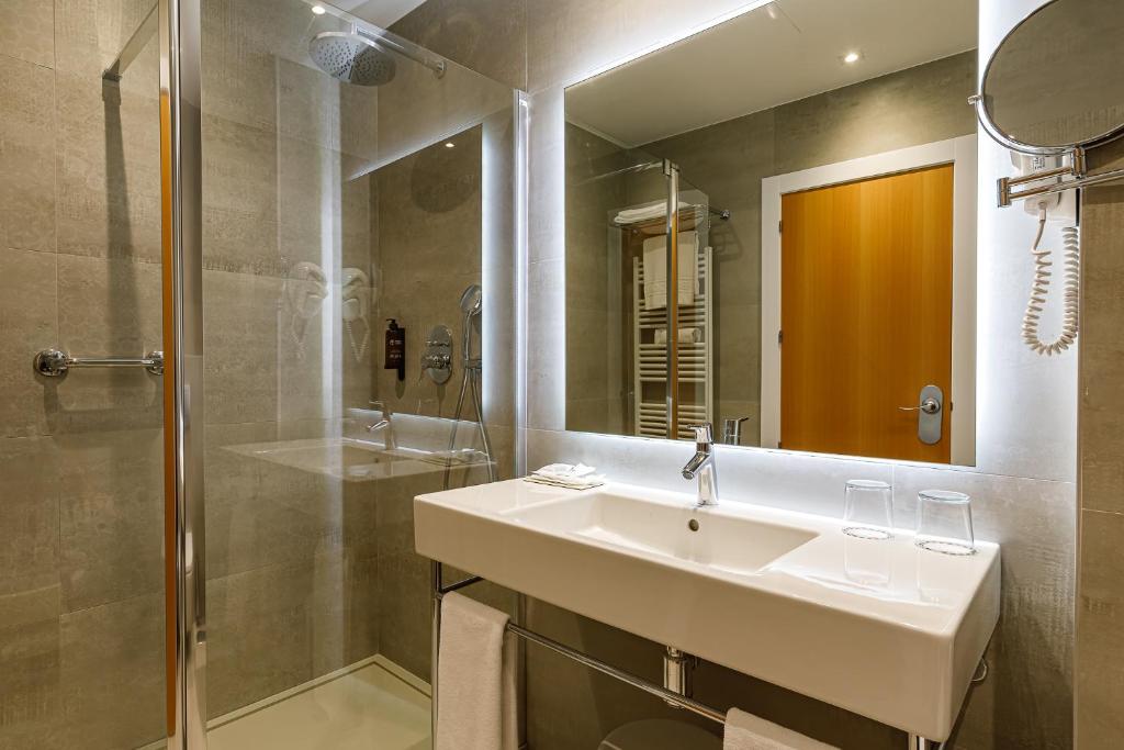 Ванная комната в Hotel Madeira Centro
