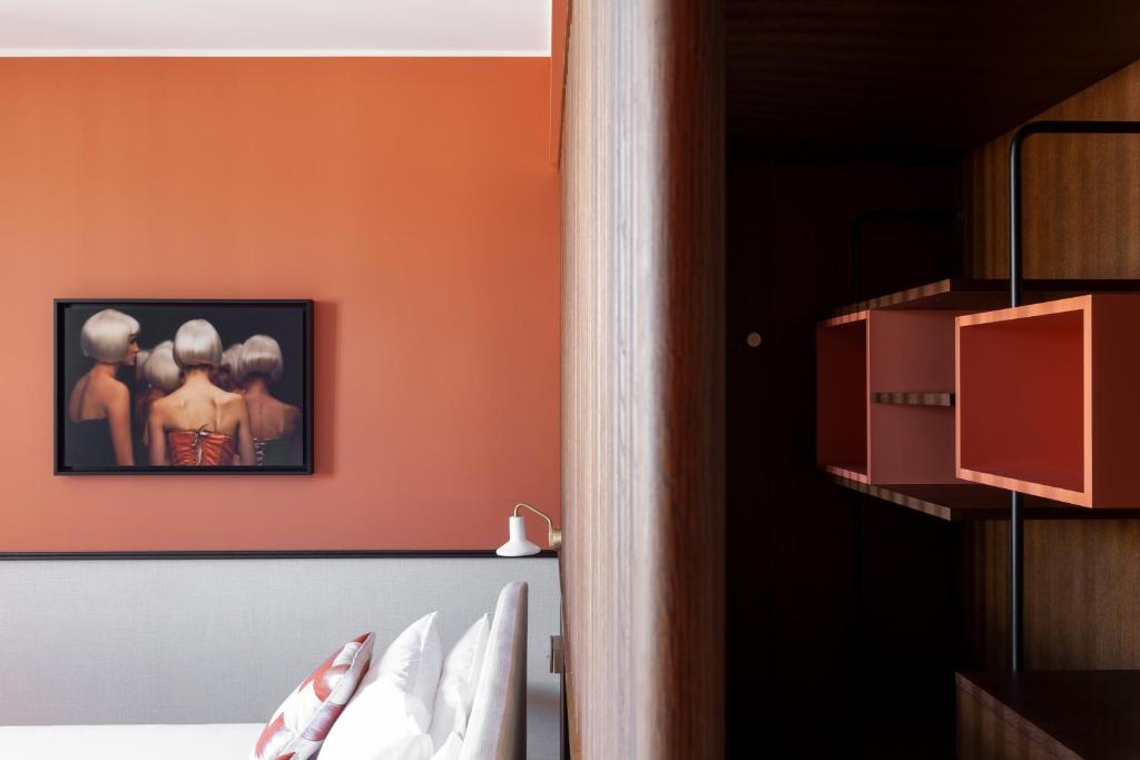 Postel nebo postele na pokoji v ubytování Amabilia Suites