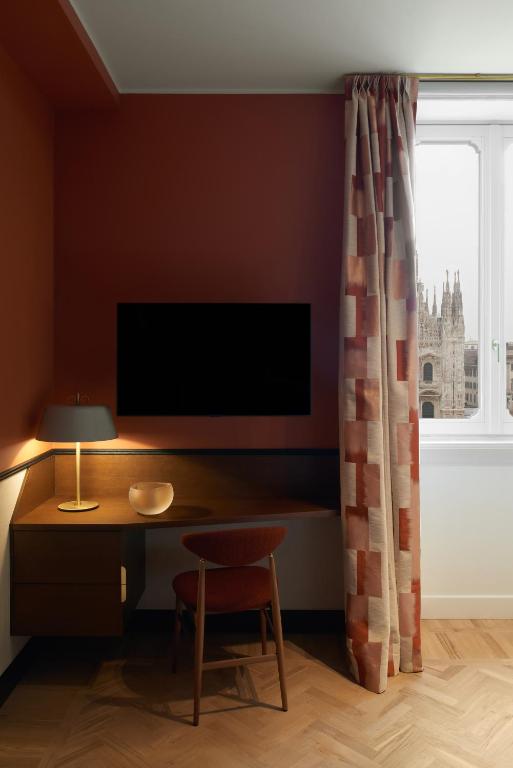 TV a/nebo společenská místnost v ubytování Amabilia Suites