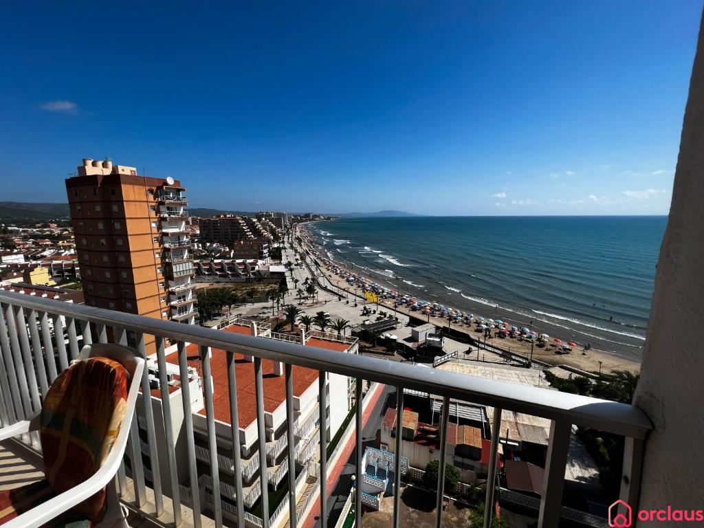 a balcony with a view of a beach and the ocean at Brisa Marina Mediterránea in Oropesa del Mar