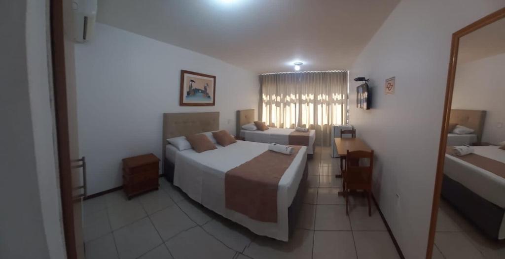 Postel nebo postele na pokoji v ubytování Max Hotel