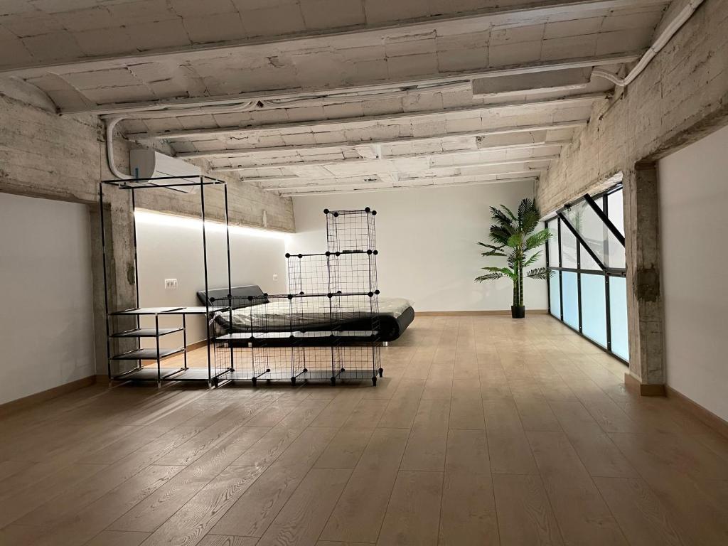Postel nebo postele na pokoji v ubytování Manresa industrial home