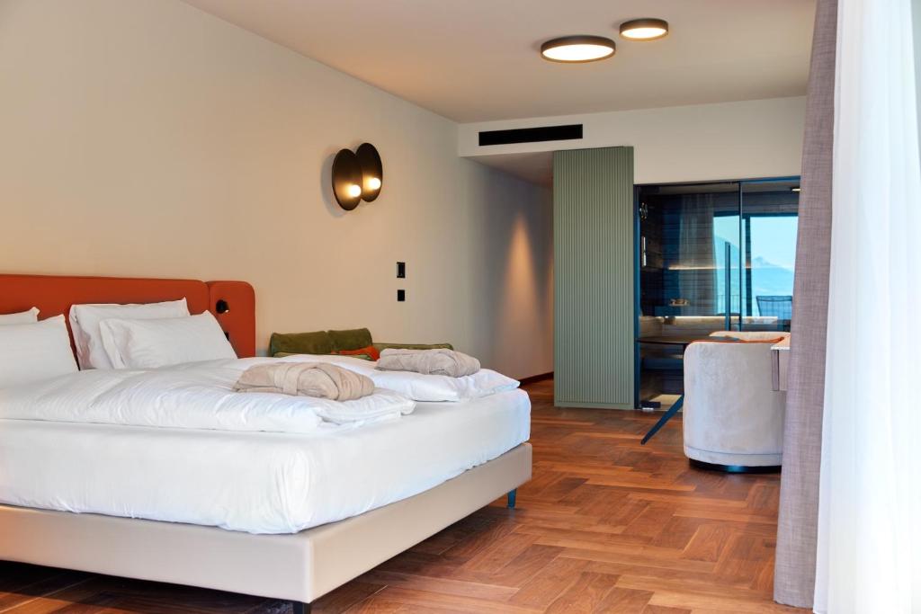 Postel nebo postele na pokoji v ubytování Hotel Baia Verde