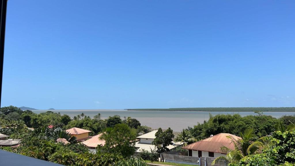 a view of the water from a resort at Hauts du Fort - Résidence 4 Étoiles in Beau Soleil