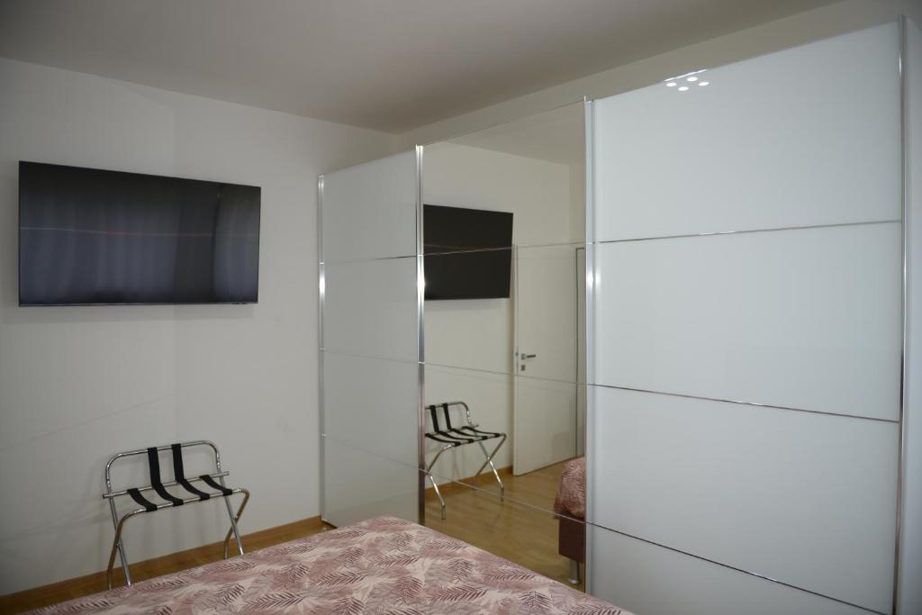 A television and/or entertainment centre at Appartamento Laura
