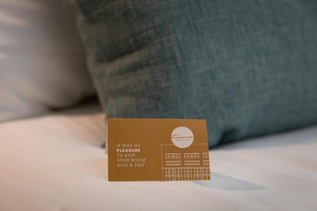 Postel nebo postele na pokoji v ubytování Dune Hotel Nieuwpoort