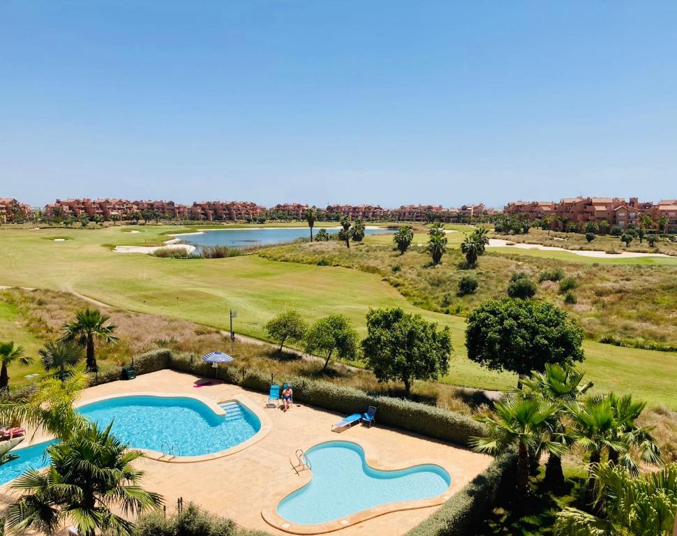 Bazén v ubytování Zeer trendy 2-bed penthouse op de Mar Menor Golf & Padel Resort nebo v jeho okolí