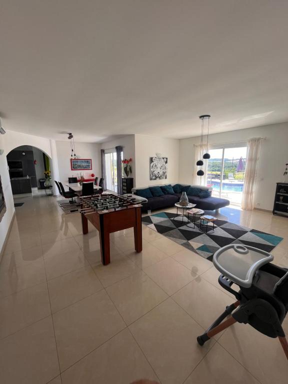 Część wypoczynkowa w obiekcie Villa avec piscine privée