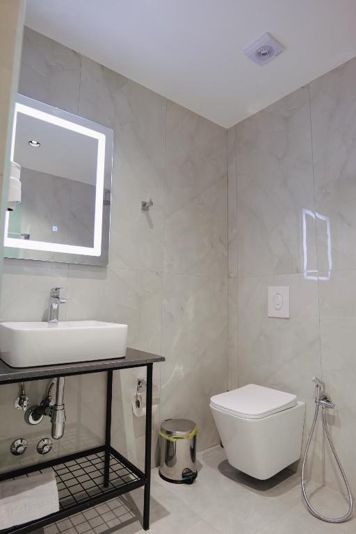 Koupelna v ubytování Hotel Vola