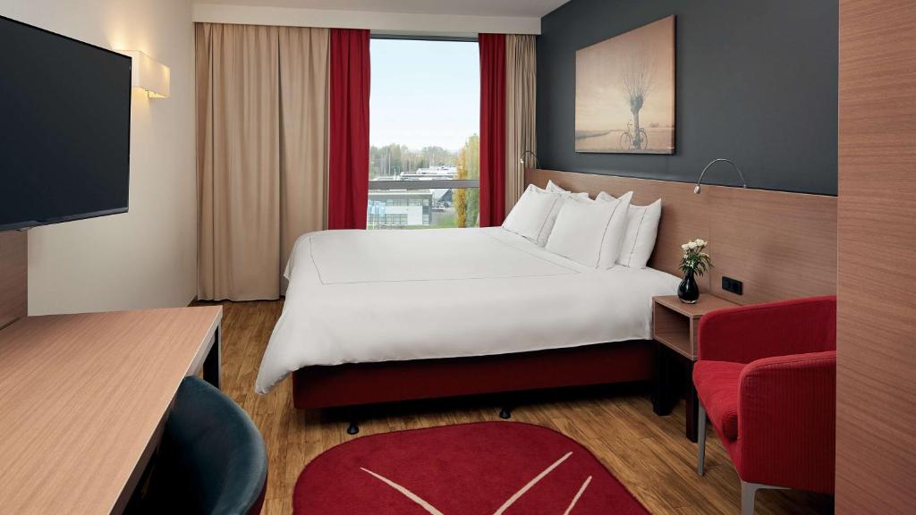 Postel nebo postele na pokoji v ubytování Park Plaza Amsterdam Airport