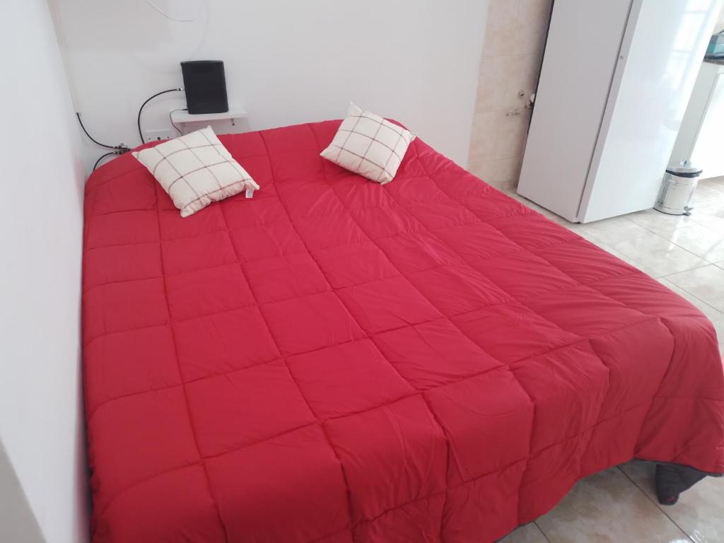 Postel nebo postele na pokoji v ubytování Monoambiente céntrico