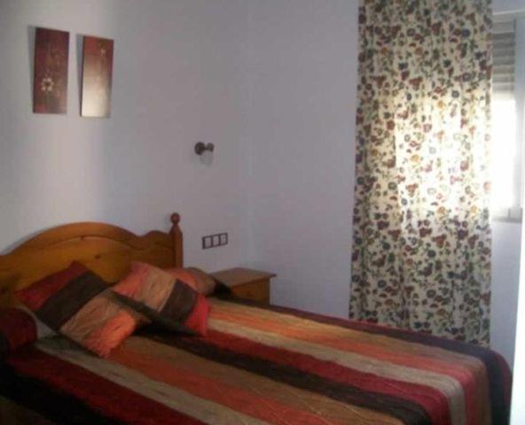 Posteľ alebo postele v izbe v ubytovaní Apartamentos Albamar II