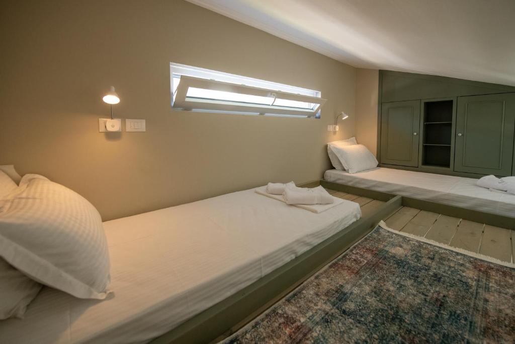 Postel nebo postele na pokoji v ubytování Hotel Vila 11
