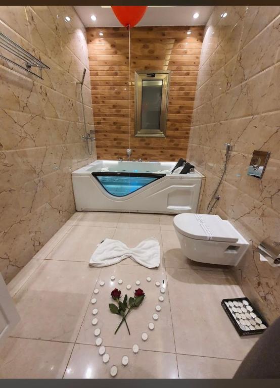 Koupelna v ubytování Mrfaaliah for Furnished Apartments مرفا عاليه للشقق المخدومة
