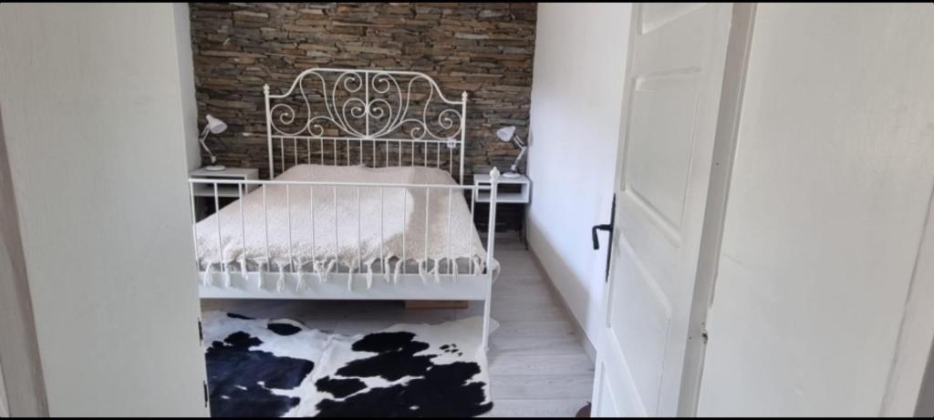 Postel nebo postele na pokoji v ubytování Garden Apartment