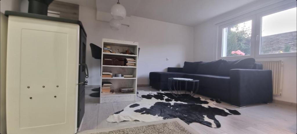 Posezení v ubytování Garden Apartment