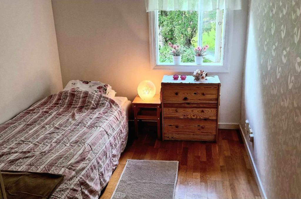 Postel nebo postele na pokoji v ubytování Berggården Vandrarhem