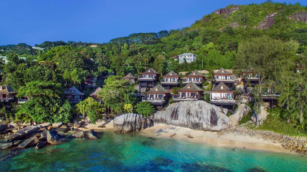 an aerial view of a resort on a beach at Hilton Seychelles Northolme Resort & Spa in Beau Vallon