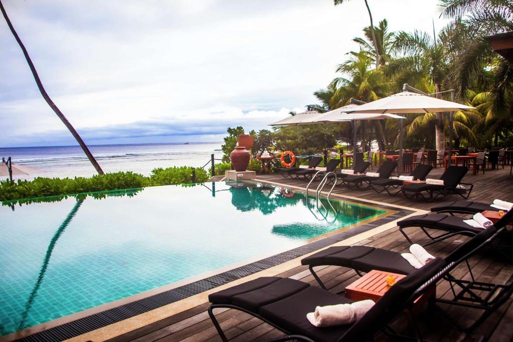 Bazén v ubytování DoubleTree by Hilton Seychelles Allamanda Resort & Spa nebo v jeho okolí