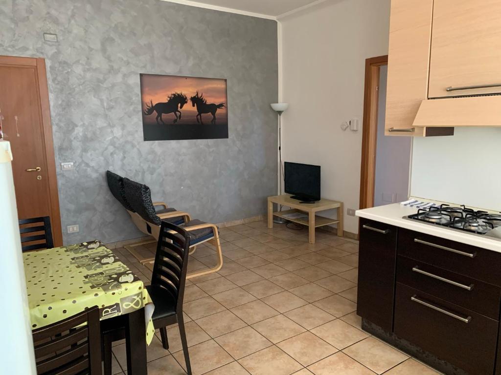 Kuchyň nebo kuchyňský kout v ubytování La Chiocciola Guesthouse Briantea
