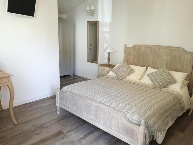 Postel nebo postele na pokoji v ubytování B&B Nadine