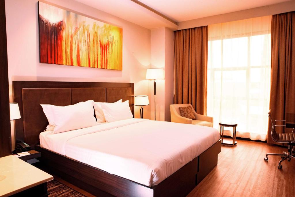 Postel nebo postele na pokoji v ubytování DoubleTree by Hilton Nairobi