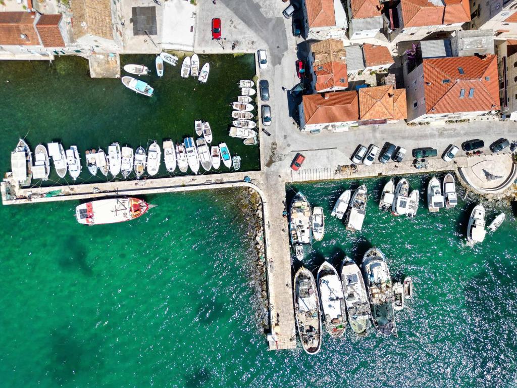 an aerial view of a marina with boats in the water at Heritage Art Home in Trogir