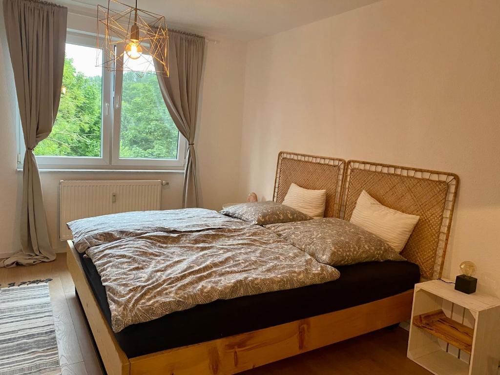 เตียงในห้องที่ Ferienwohnung für Naturliebhaber