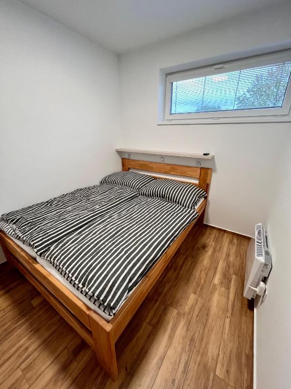 Postel nebo postele na pokoji v ubytování U Srubu