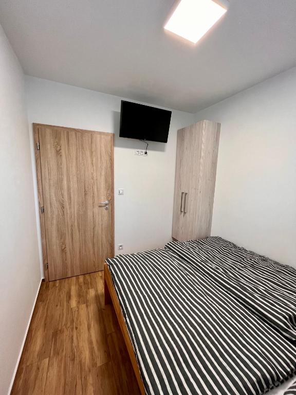 Postel nebo postele na pokoji v ubytování U Srubu