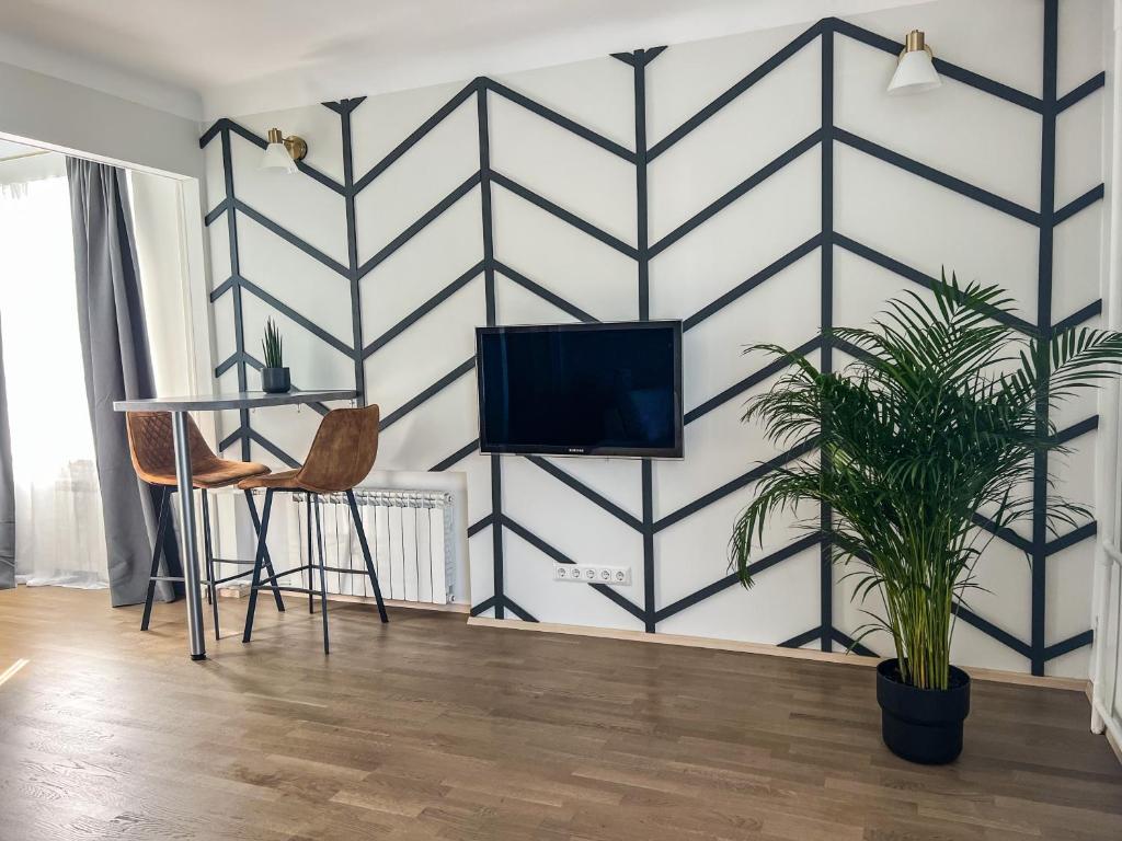 TV a/nebo společenská místnost v ubytování ARKA Apartment Pärnu mnt