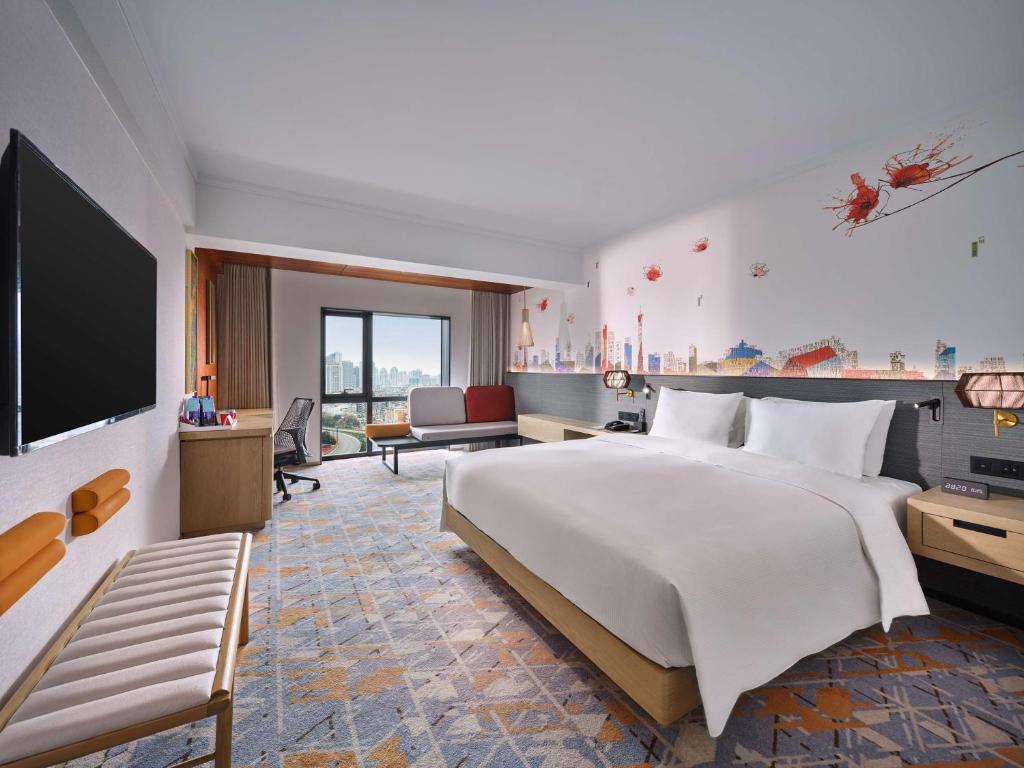 Postel nebo postele na pokoji v ubytování Hilton Garden Inn Guangzhou Tianhe