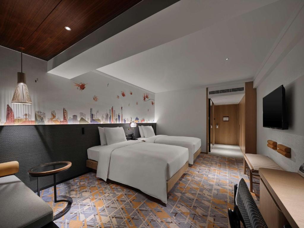 TV a/nebo společenská místnost v ubytování Hilton Garden Inn Guangzhou Tianhe