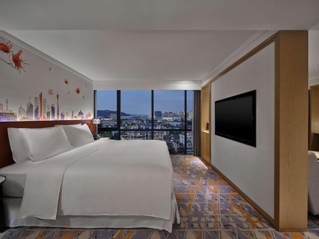 Postel nebo postele na pokoji v ubytování Hilton Garden Inn Guangzhou Tianhe